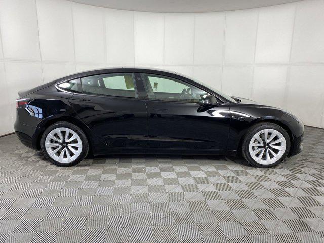 used 2022 Tesla Model 3 car, priced at $27,997