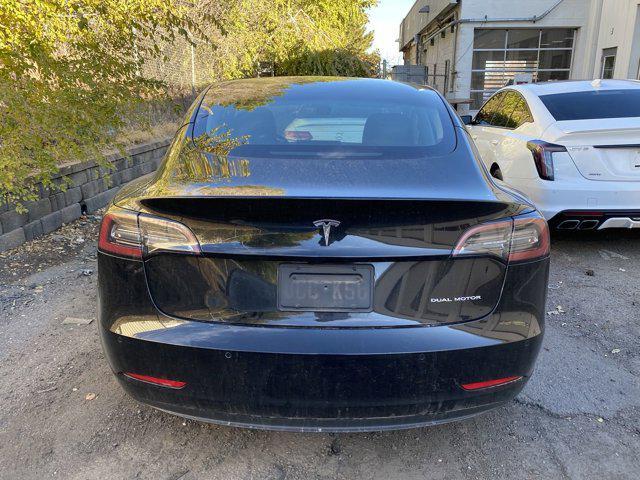 used 2022 Tesla Model 3 car, priced at $28,999