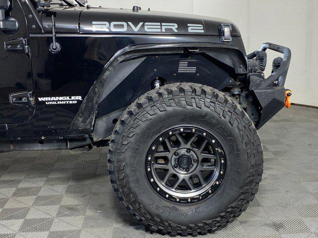 used 2014 Jeep Wrangler Unlimited car, priced at $16,998