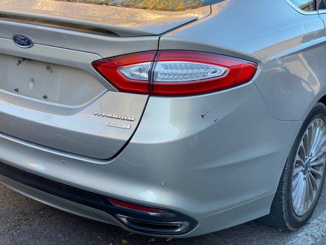 used 2015 Ford Fusion car, priced at $4,299