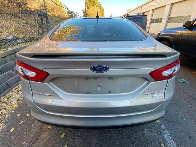 used 2015 Ford Fusion car, priced at $4,299