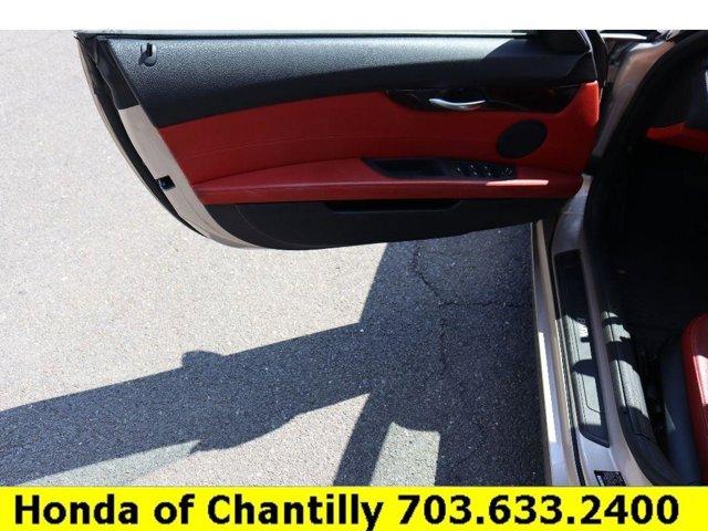 used 2011 BMW Z4 car, priced at $14,691