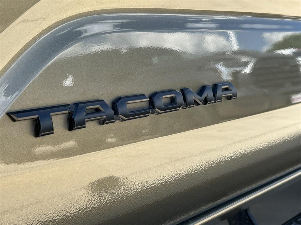 used 2024 Toyota Tacoma car, priced at $49,991