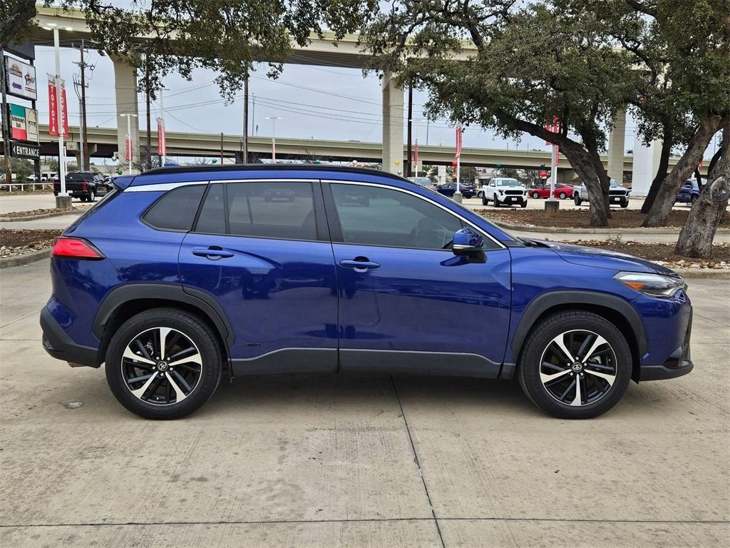 used 2023 Toyota Corolla Cross Hybrid car, priced at $32,013