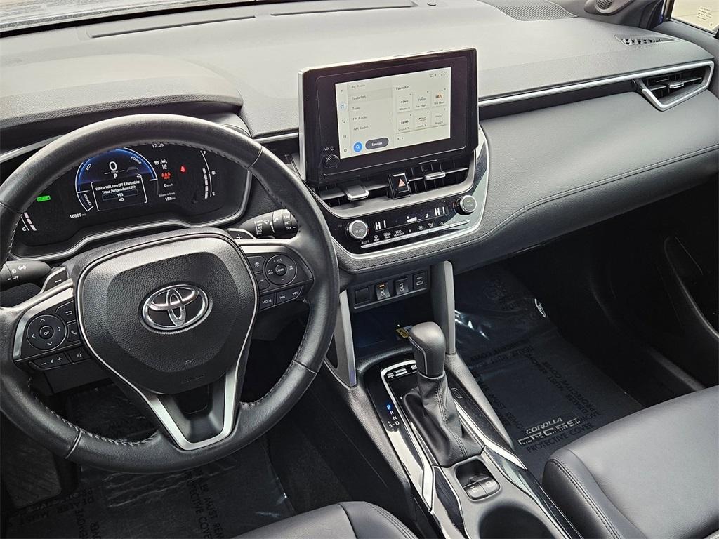 used 2023 Toyota Corolla Cross Hybrid car, priced at $32,013