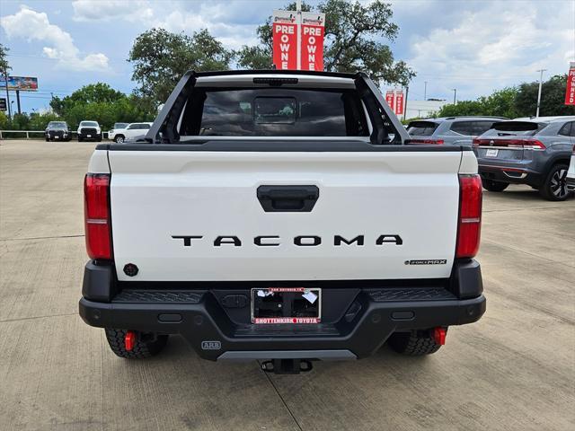 used 2025 Toyota Tacoma Hybrid car, priced at $74,991
