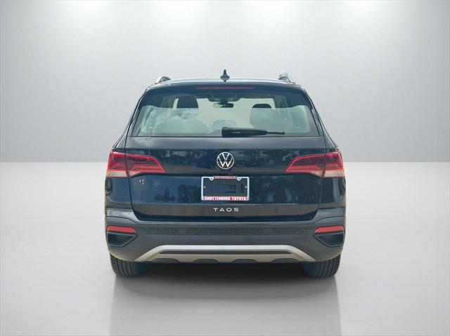 used 2024 Volkswagen Taos car, priced at $22,021