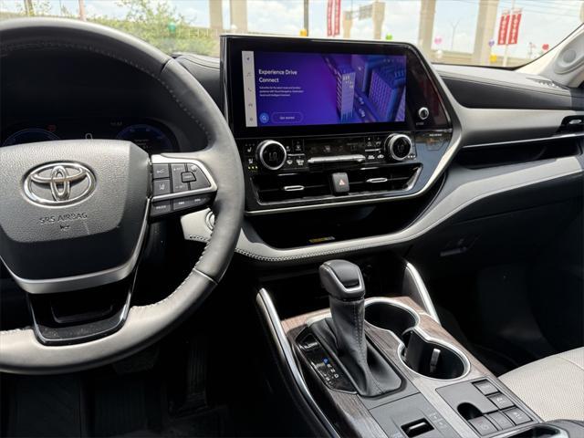 used 2023 Toyota Highlander Hybrid car, priced at $45,891