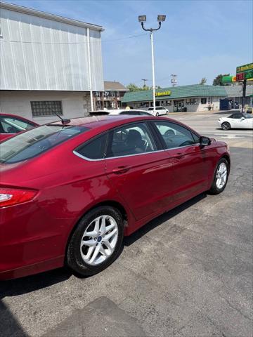 used 2014 Ford Fusion car, priced at $7,995