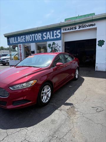 used 2014 Ford Fusion car, priced at $7,995