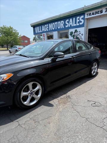used 2014 Ford Fusion car, priced at $7,995