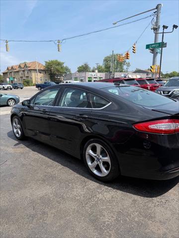 used 2014 Ford Fusion car, priced at $7,995