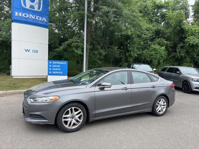used 2014 Ford Fusion car, priced at $7,495