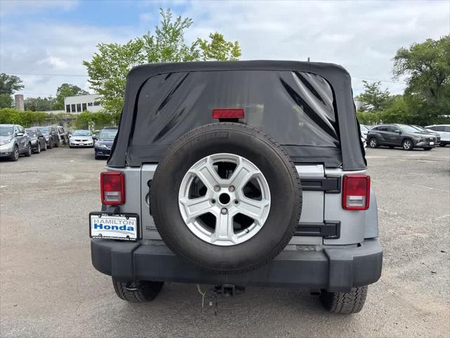 used 2014 Jeep Wrangler car, priced at $13,995