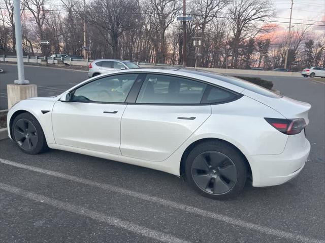 used 2023 Tesla Model 3 car, priced at $26,495