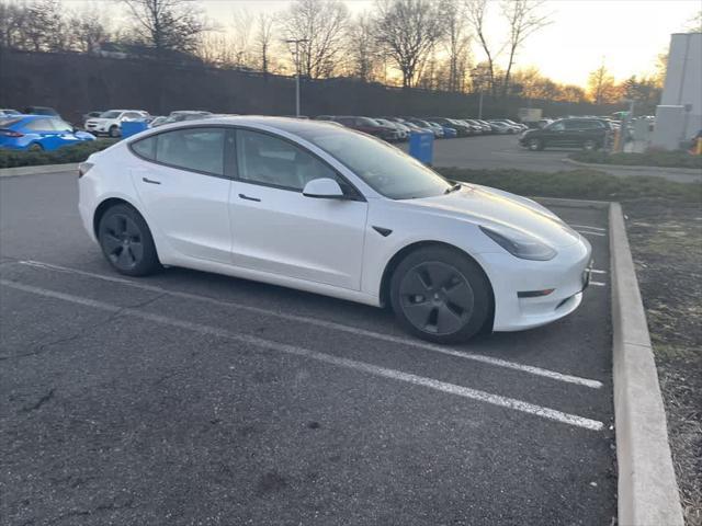 used 2023 Tesla Model 3 car, priced at $26,495