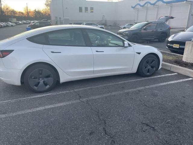 used 2023 Tesla Model 3 car, priced at $26,495