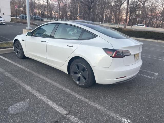 used 2023 Tesla Model 3 car, priced at $26,495