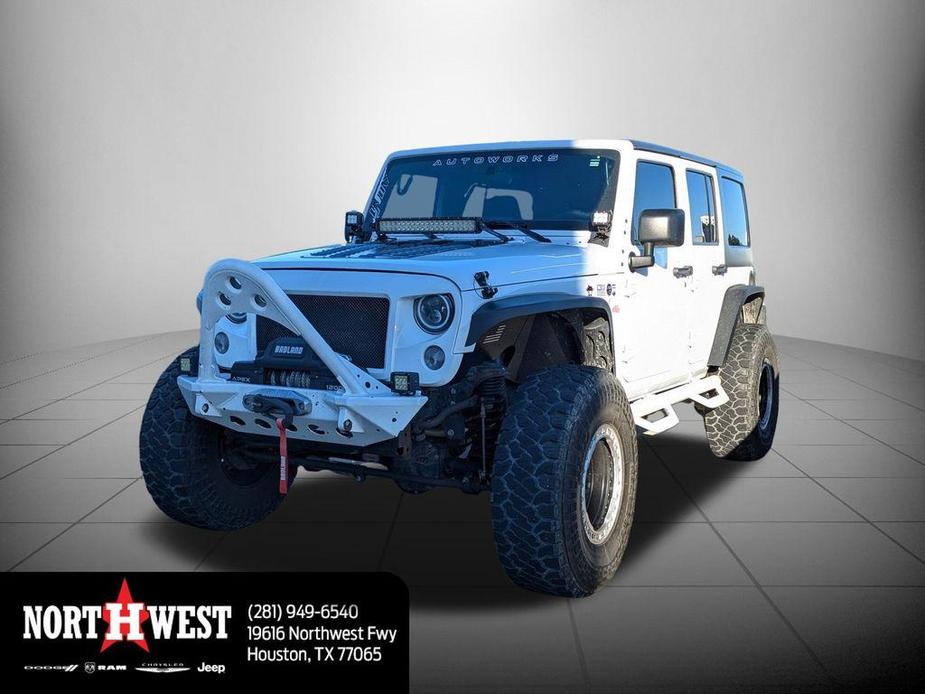 used 2016 Jeep Wrangler Unlimited car, priced at $20,260