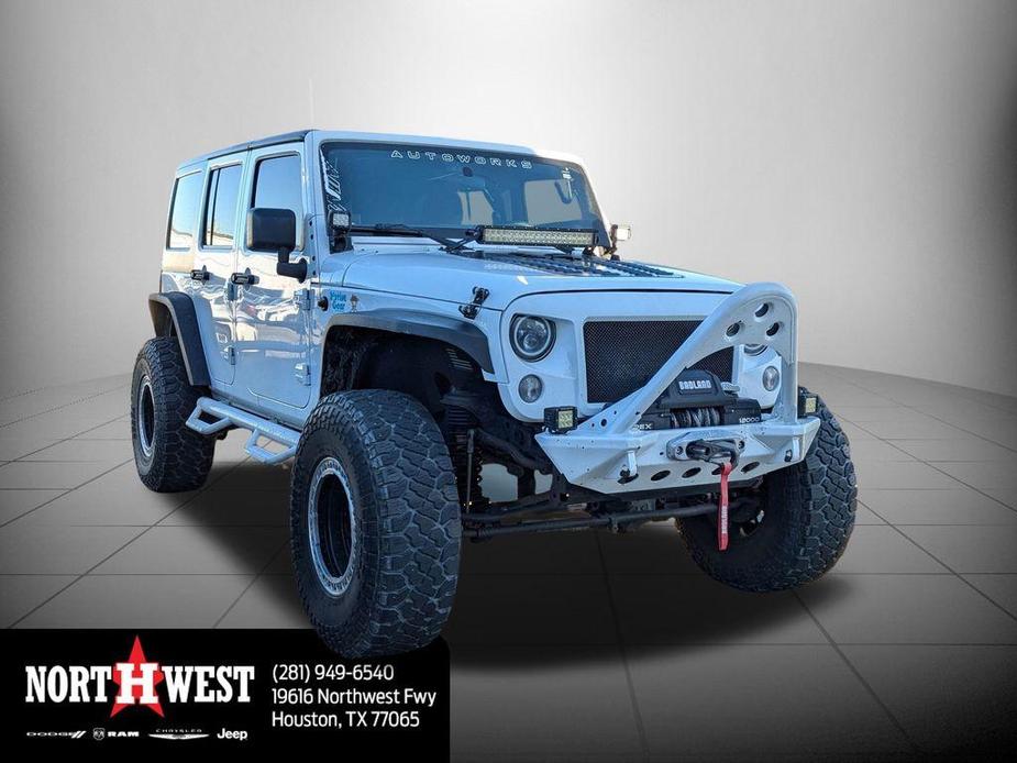 used 2016 Jeep Wrangler Unlimited car, priced at $20,260