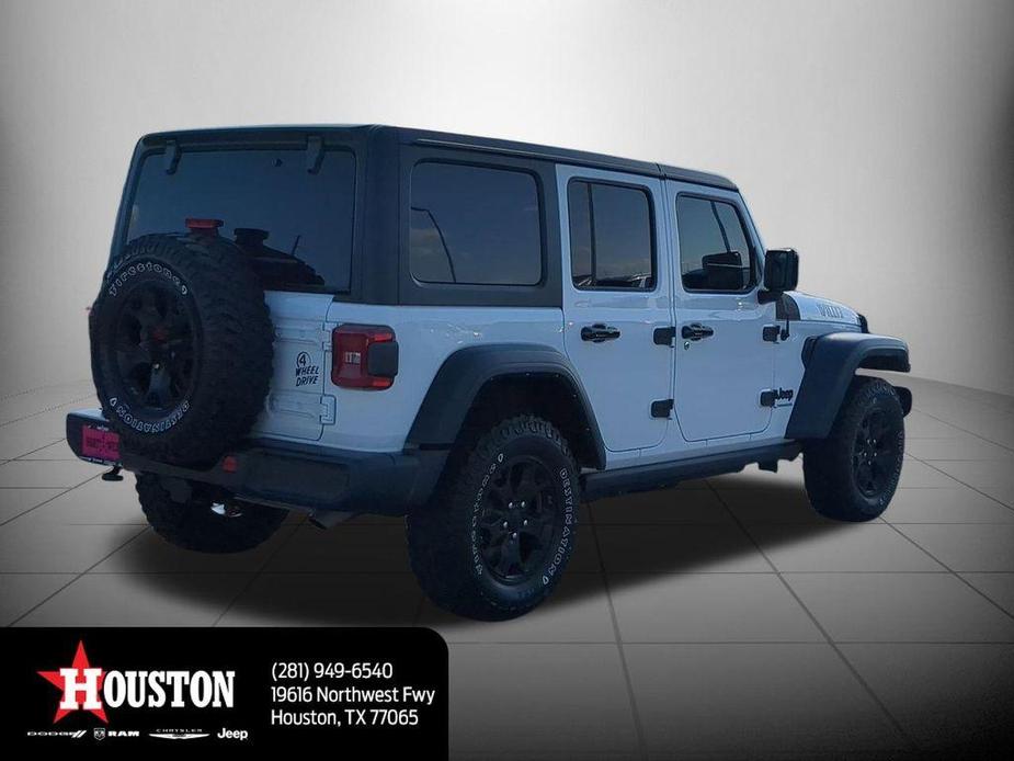 used 2023 Jeep Wrangler car, priced at $30,593