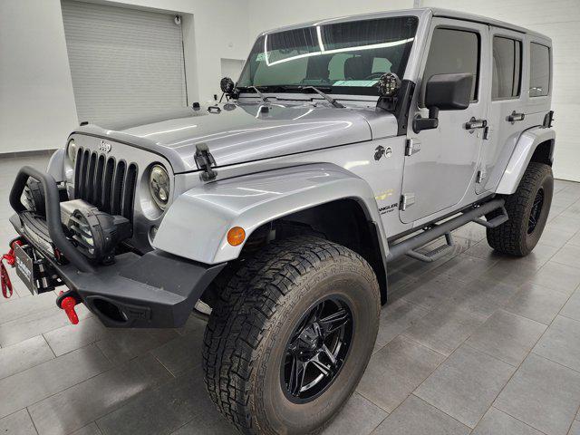 used 2014 Jeep Wrangler Unlimited car, priced at $23,999