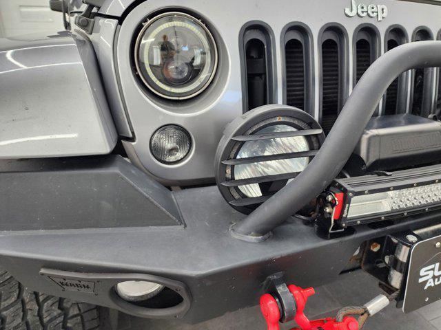 used 2014 Jeep Wrangler Unlimited car, priced at $23,999