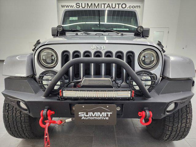 used 2014 Jeep Wrangler Unlimited car, priced at $23,999