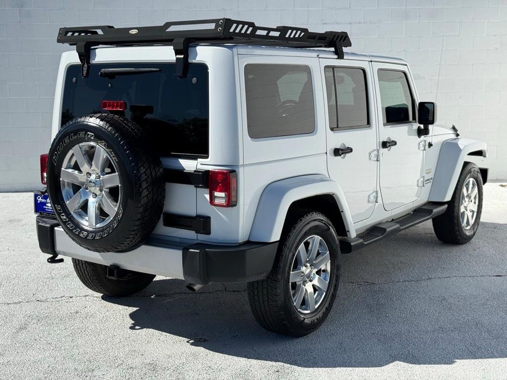 used 2015 Jeep Wrangler Unlimited car, priced at $17,469