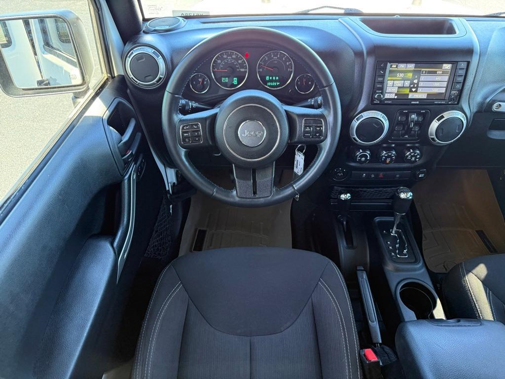 used 2015 Jeep Wrangler Unlimited car, priced at $17,469