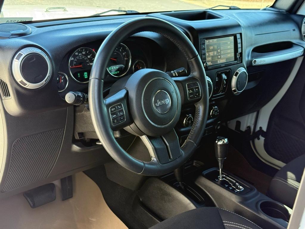 used 2015 Jeep Wrangler Unlimited car, priced at $17,469