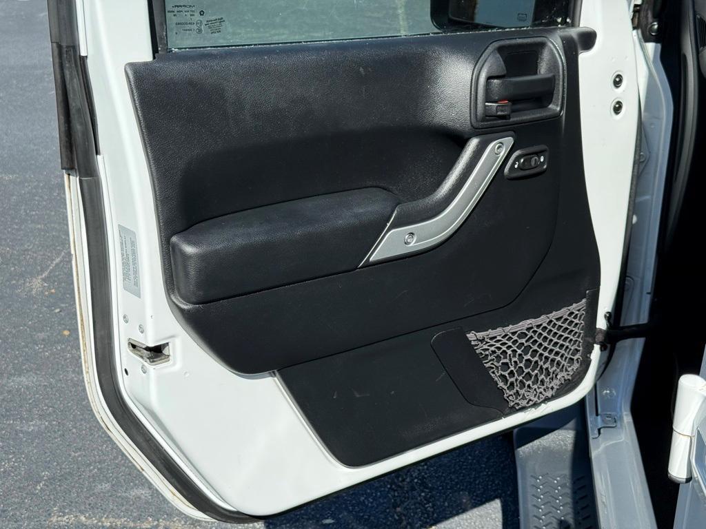 used 2015 Jeep Wrangler Unlimited car, priced at $17,469