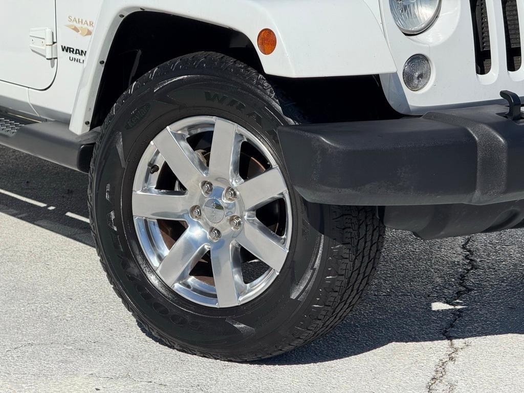 used 2015 Jeep Wrangler Unlimited car, priced at $17,469