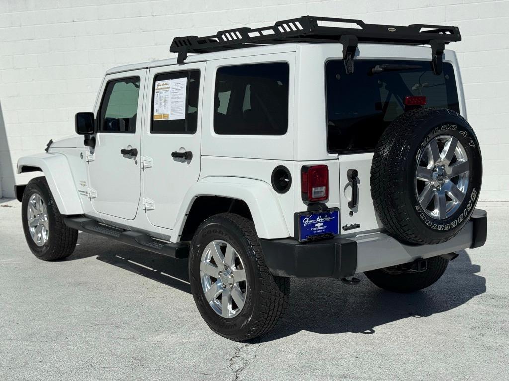 used 2015 Jeep Wrangler Unlimited car, priced at $17,469