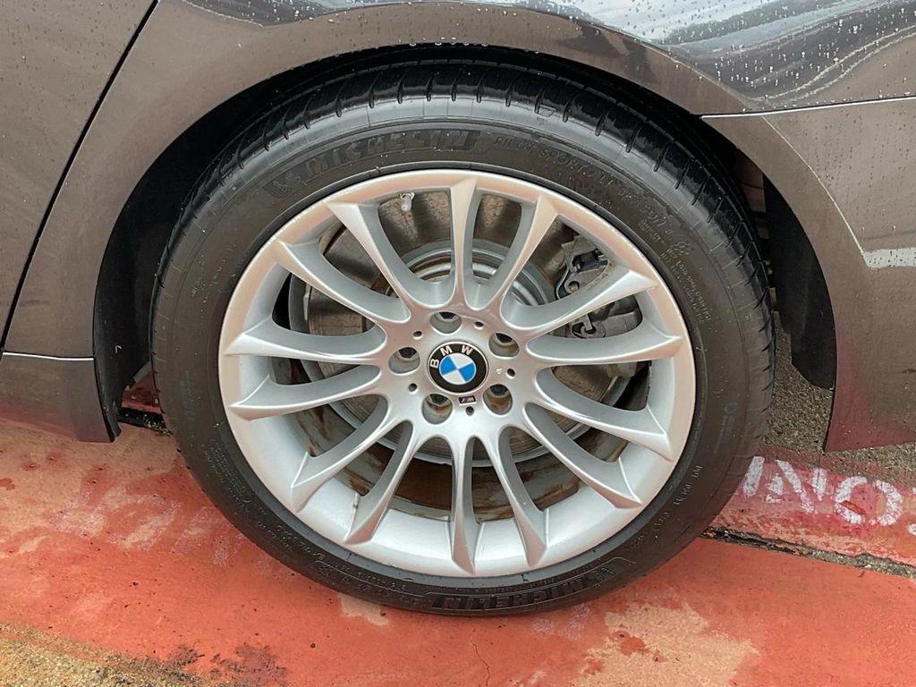 used 2015 BMW 750 car, priced at $11,901