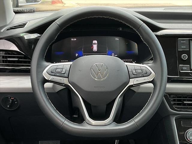 used 2024 Volkswagen Taos car, priced at $19,901