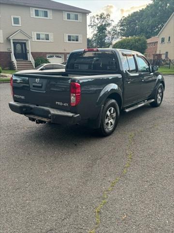 used 2013 Nissan Frontier car, priced at $9,995