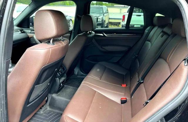 used 2016 BMW X4 car, priced at $18,499