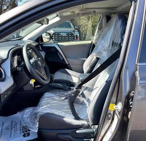 used 2013 Toyota RAV4 car, priced at $15,499