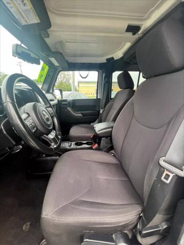 used 2015 Jeep Wrangler Unlimited car, priced at $14,999