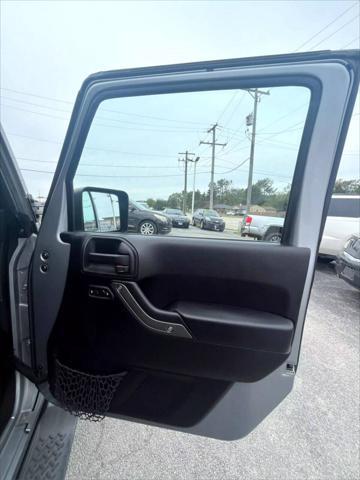 used 2015 Jeep Wrangler Unlimited car, priced at $14,999