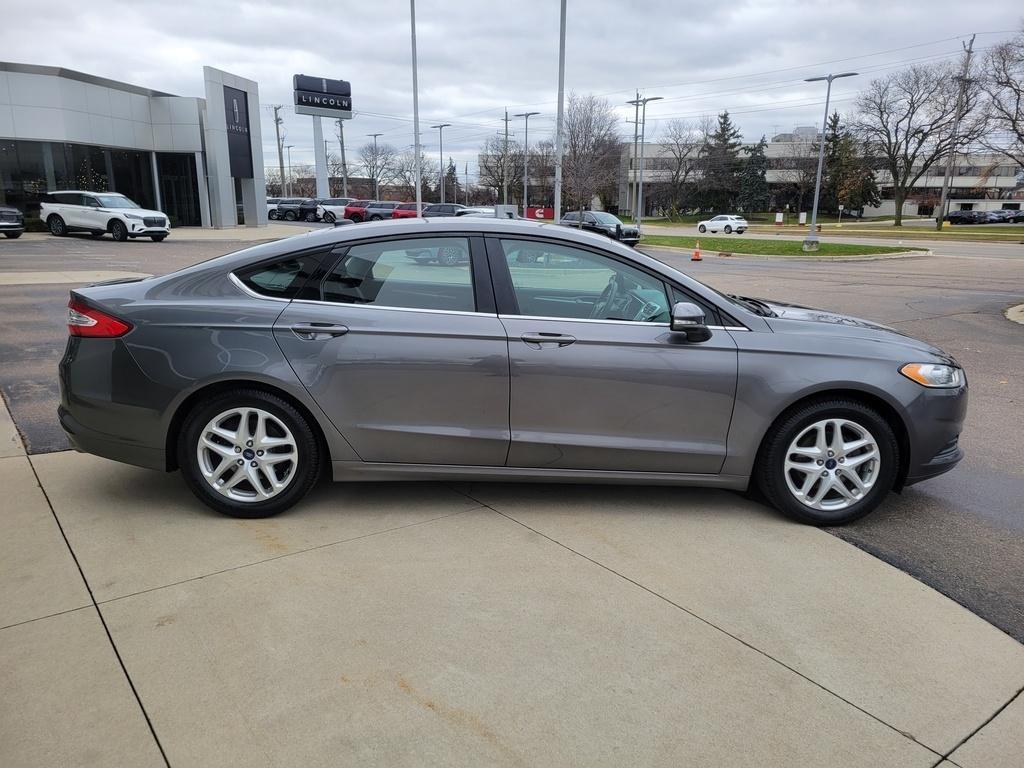 used 2014 Ford Fusion car, priced at $7,900