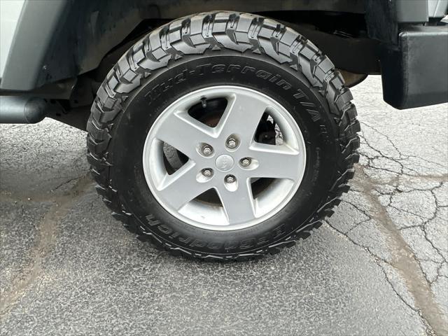 used 2014 Jeep Wrangler car, priced at $13,997