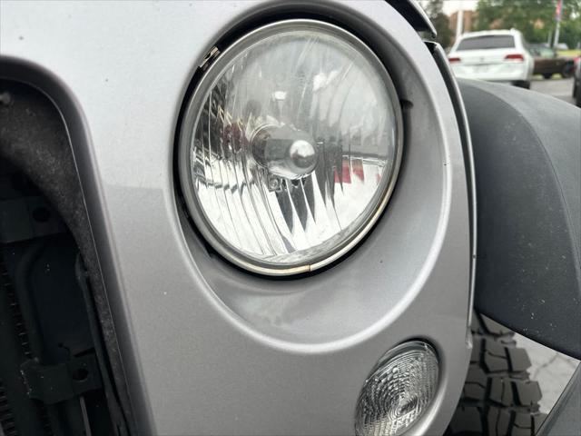 used 2014 Jeep Wrangler car, priced at $13,997
