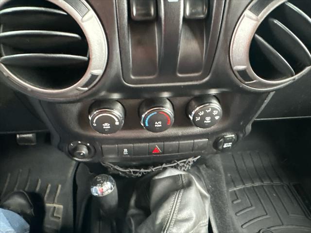 used 2014 Jeep Wrangler car, priced at $13,997