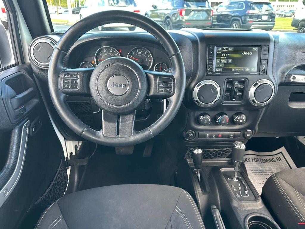 used 2016 Jeep Wrangler Unlimited car, priced at $14,952