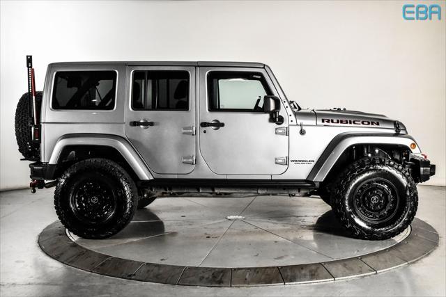 used 2016 Jeep Wrangler Unlimited car, priced at $27,580