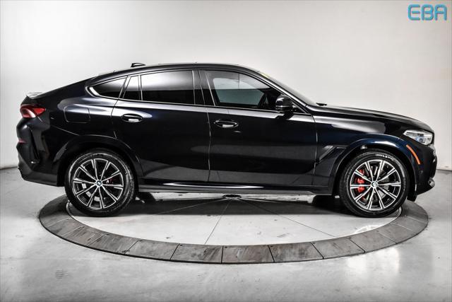 used 2022 BMW X6 car, priced at $64,880