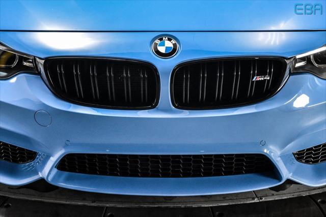 used 2018 BMW M4 car, priced at $41,880