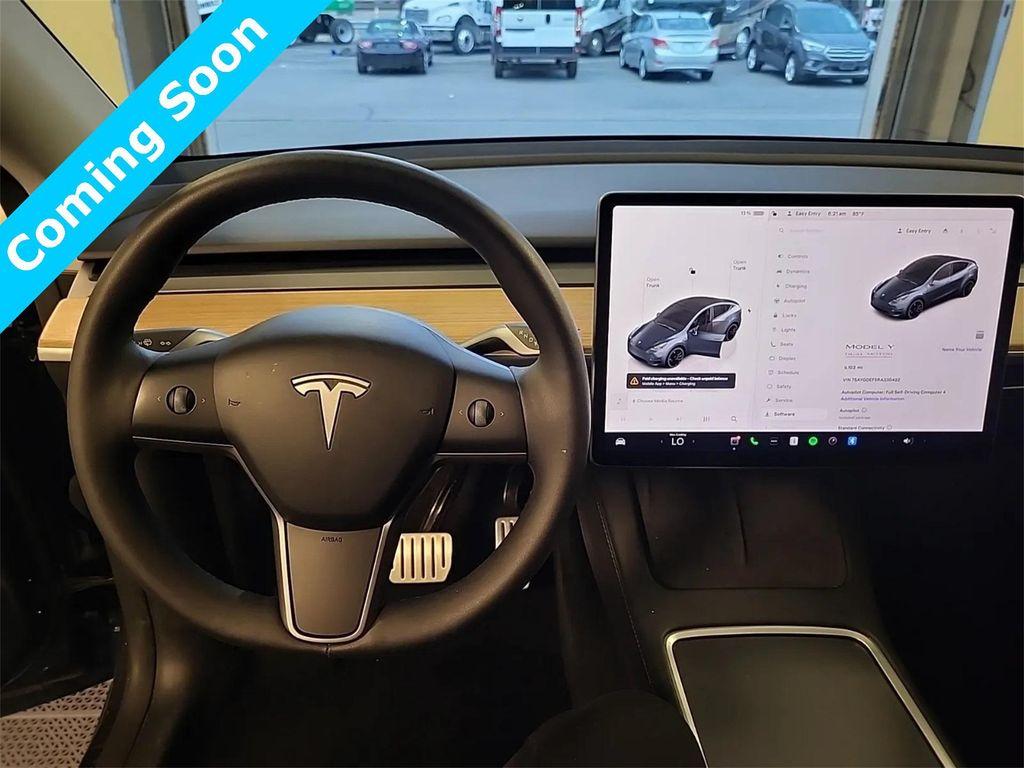 used 2024 Tesla Model Y car, priced at $41,880